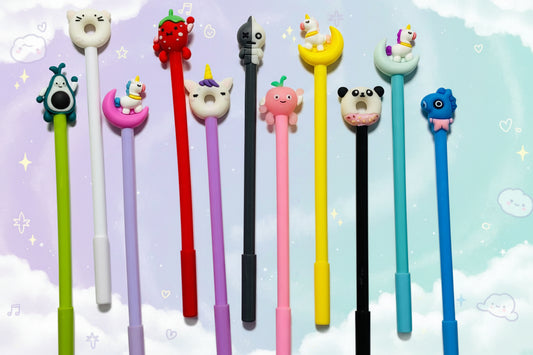 Set of colorful pens with cartoon-style pen tips on a light background