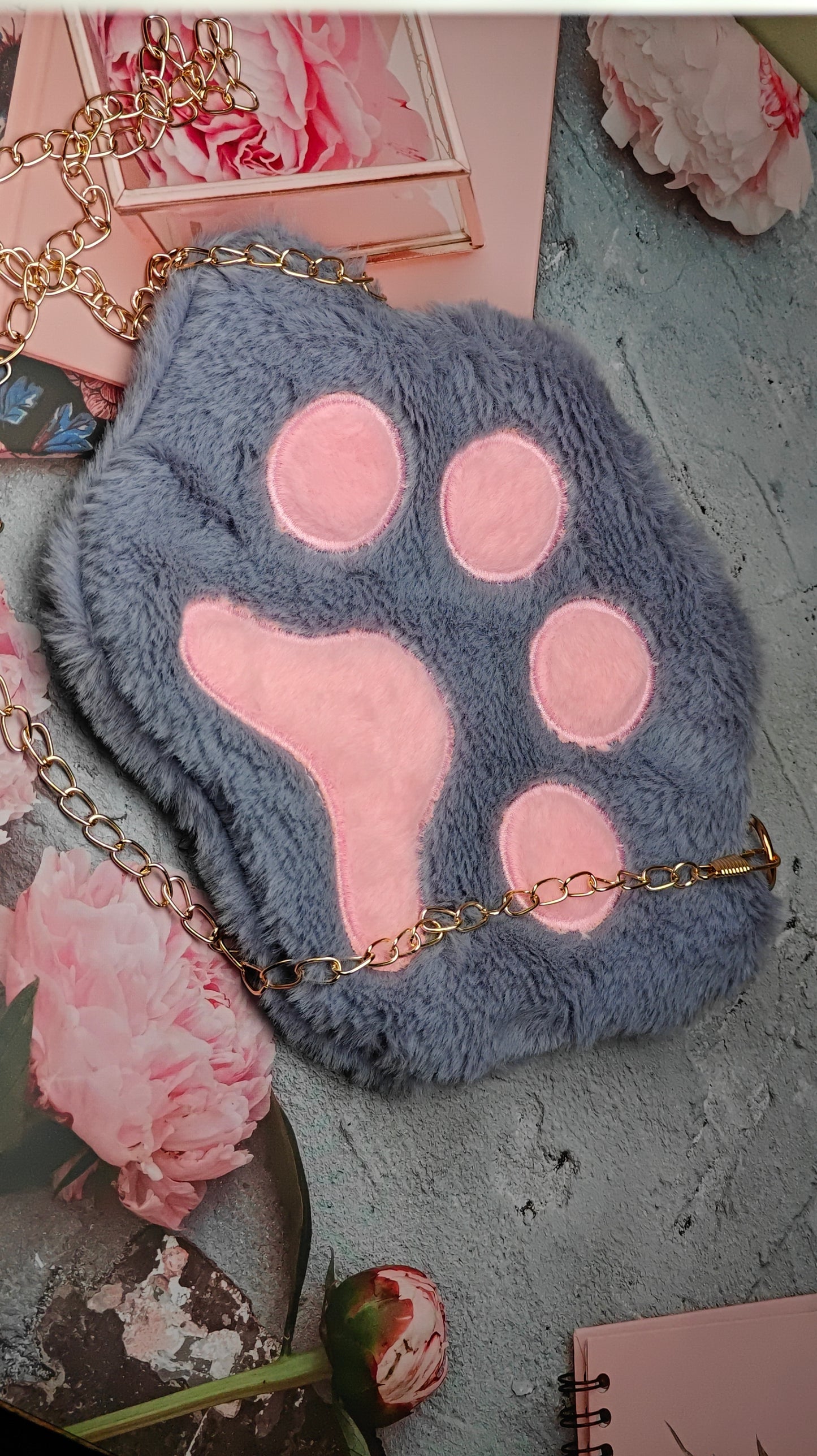 Paw shaped plush sling