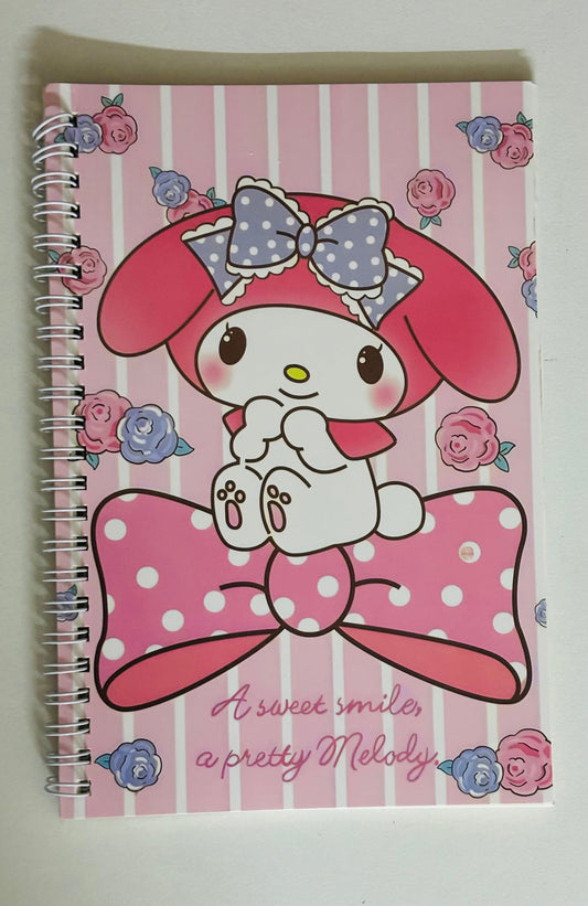 Notebook with a cartoon character on a pink and white striped background
