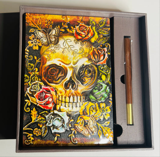 Decorative box with a skull and floral design on a white background
