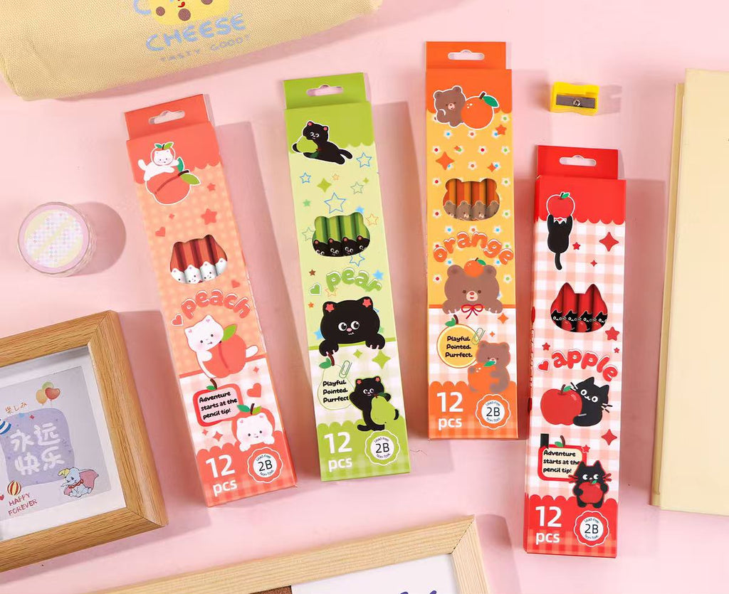 Four colorful 12-pack boxes of cute cartoon pencils arranged on a pink surface with decorative props, plus a Chinese product specification text block at the bottom.